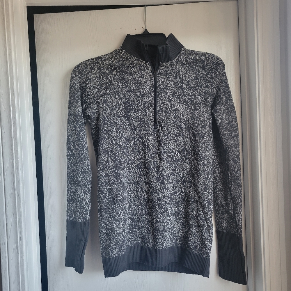 Black and grey Lululemon mock neck quarter zip up shirt